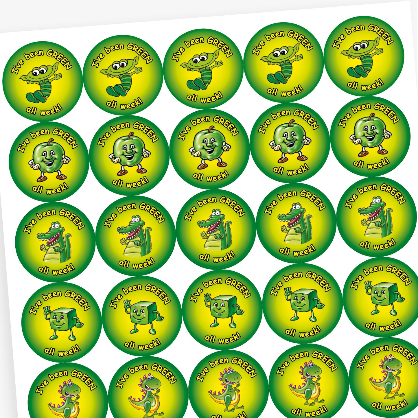Pack of 280 37mm apple-scented circular stickers featuring vibrant green backgrounds with cheerful characters—such as a smiling apple, star, dinosaur, and alien—each displaying the text 'I've been GREEN all week!'; designed to reward positive behaviour in line with the 'Good to be Green' scheme.