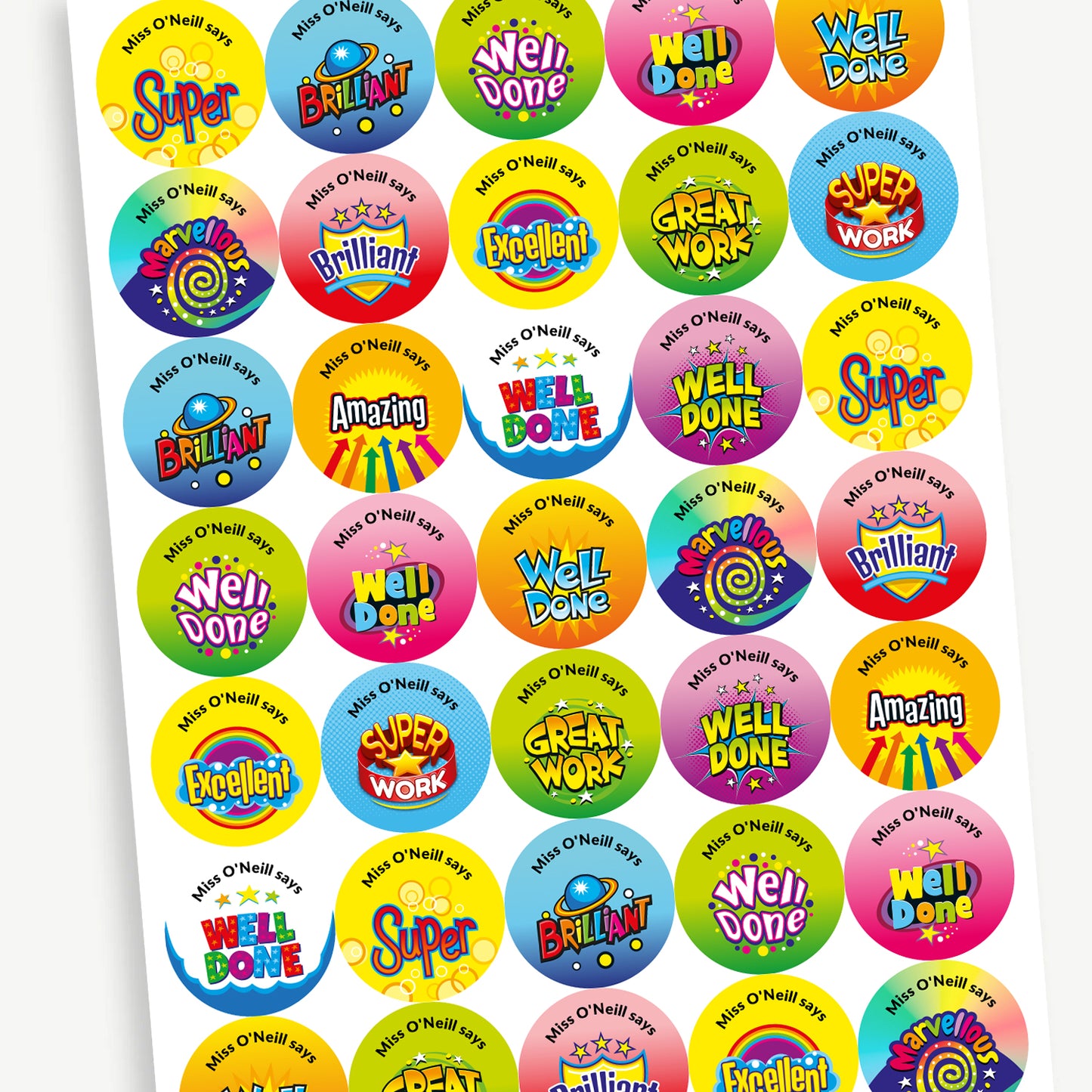 A sheet of 37mm round personalised cola scented sheet of colourful reward stickers featuring a variety of fun designs including solar, arrows, shields, and stars. Messages include 'Well Done', 'Amazing', 'Great', 'Excellent', and 'Great Work'. Text around the character is customisable.