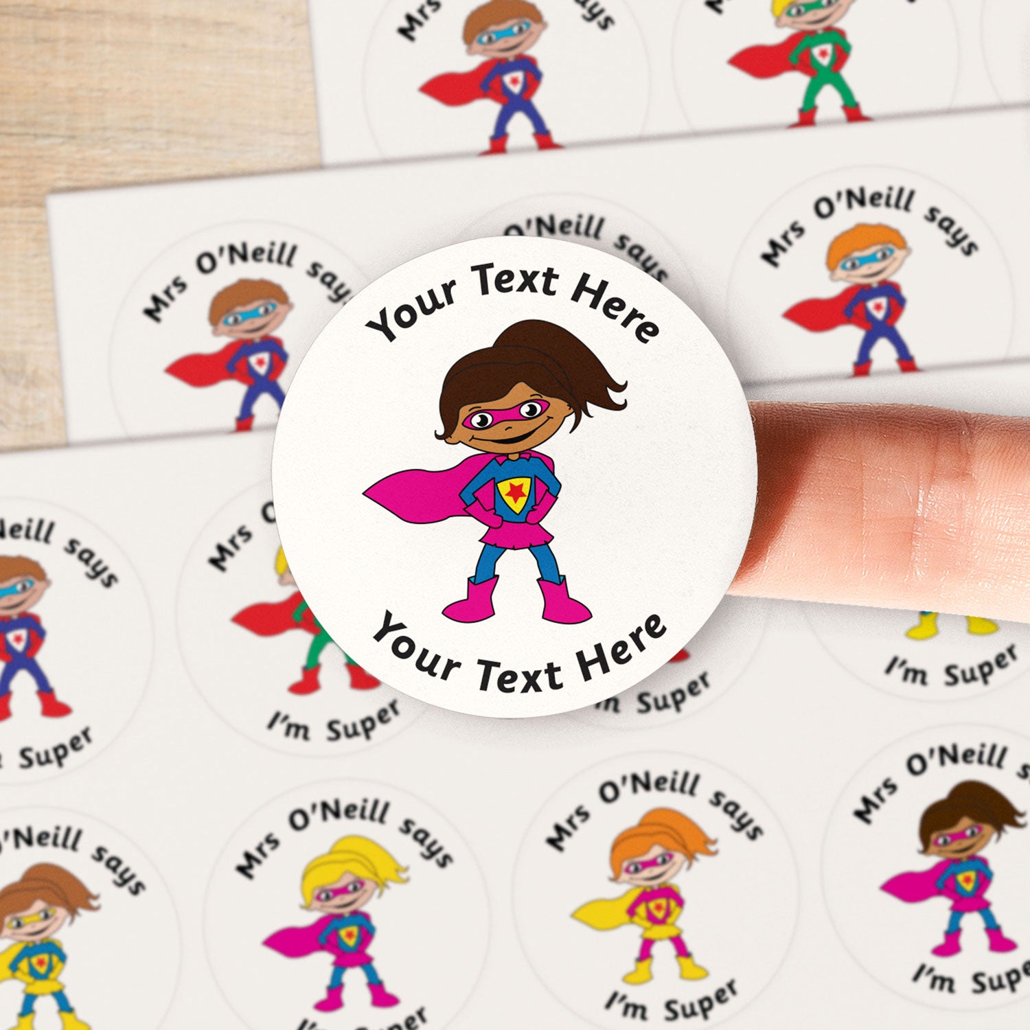 A close up image of a superhero on a sticker.  Text around the character is customisable
