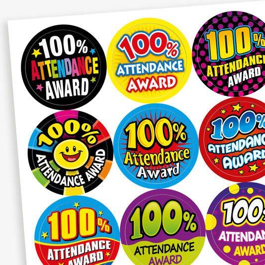 A sheet of 25mm round stickers celebrating 100% attendance. Each sticker features bold, colourful designs with the text '100% Attendance Award' in various fonts and backgrounds, including stars, smiley faces, and vibrant patterns. Ideal for rewarding pupils' perfect attendance.
