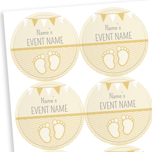 Sheet of round pale yellow stickers with a line halfway down the sticker.  The bottom half shows a pair of babies footprints against a wavy background.  Above the line placeholder text reading 'Name's    EVENT NAME' with two tone bunting at the top of the sticker.