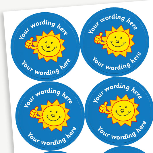 Sheet of 35 circular 37mm personalised sun stickers featuring a cheerful yellow sun with a smiling face and raised thumb, set against a vibrant blue background, with customisable white text encircling the design.