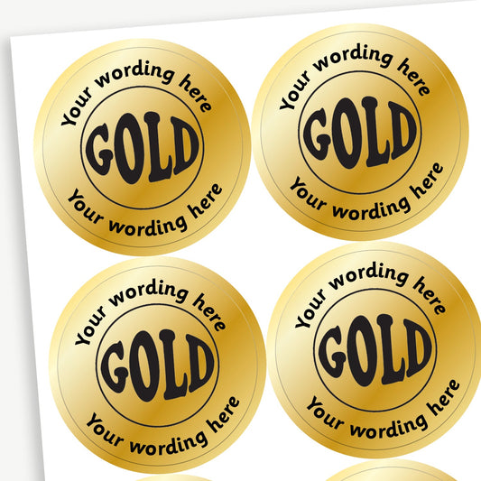 Sheet of 35 personalised 37mm circular stickers with a metallic gold finish; each sticker features a bold 'GOLD' in the centre, surrounded by the customisable text 'Your wording here' above and below, designed to reward pupils for achieving first place.
