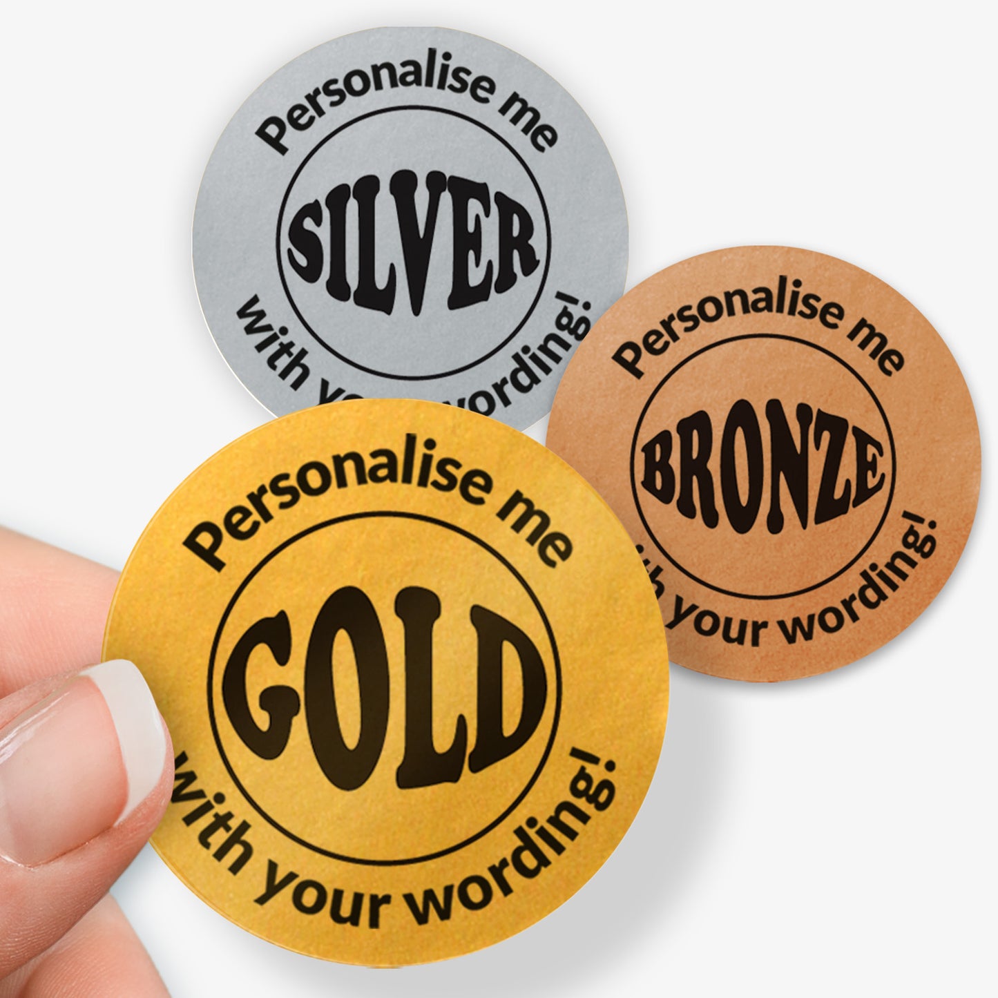 Three round stickers in gold, silver, and bronze with text 'Personalise me' and colour names.