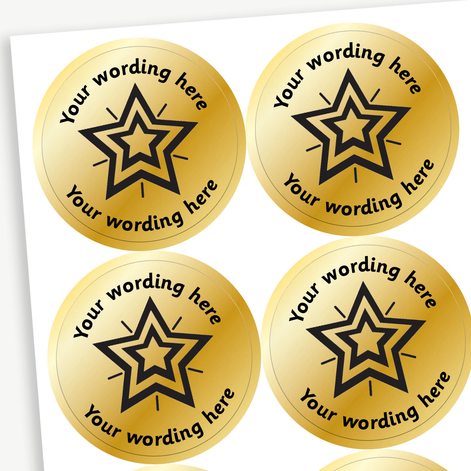 Sheet of 37mm round, metallic gold stickers, each featuring a bold black five-pointed star at the centre. Surrounding the star is placeholder text reading 'Your wording here' above and below, indicating customisable areas for personalised messages
