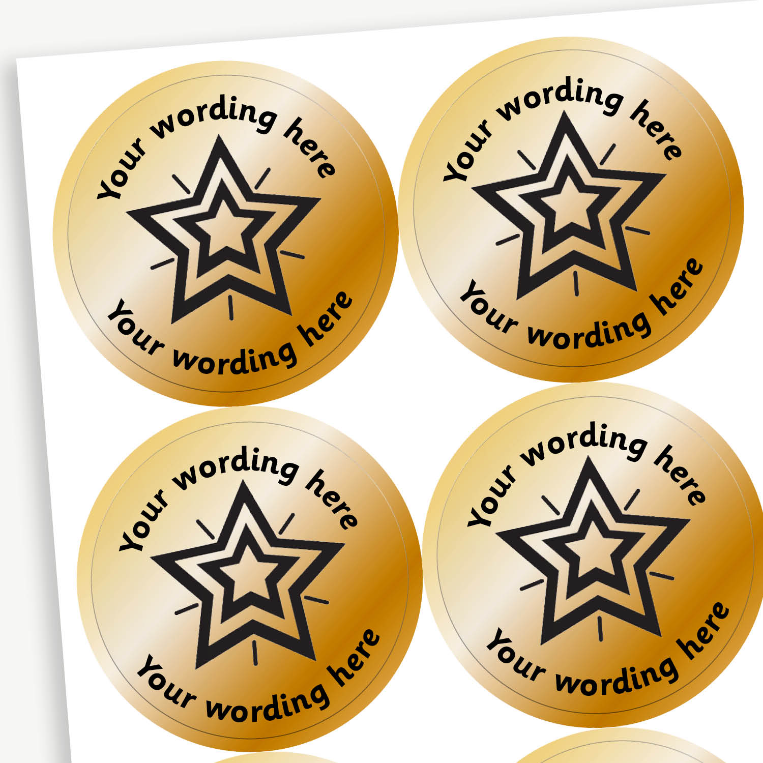 Sheet of 37mm round, metallic bronze stickers, each featuring a bold black five-pointed star at the centre. Surrounding the star is placeholder text reading 'Your wording here' above and below, indicating customisable areas for personalised messages
