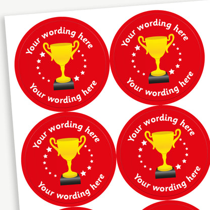 Circular 37mm stickers, red in colour and each featuring a golden trophy icon at the centre, surrounded by white stars, with customisable text above and below the trophy - choice of colours
