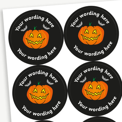A sheet of customisable circular stickers featuring a carved pumpkin against a black background; includes customisable text above and below the image.
