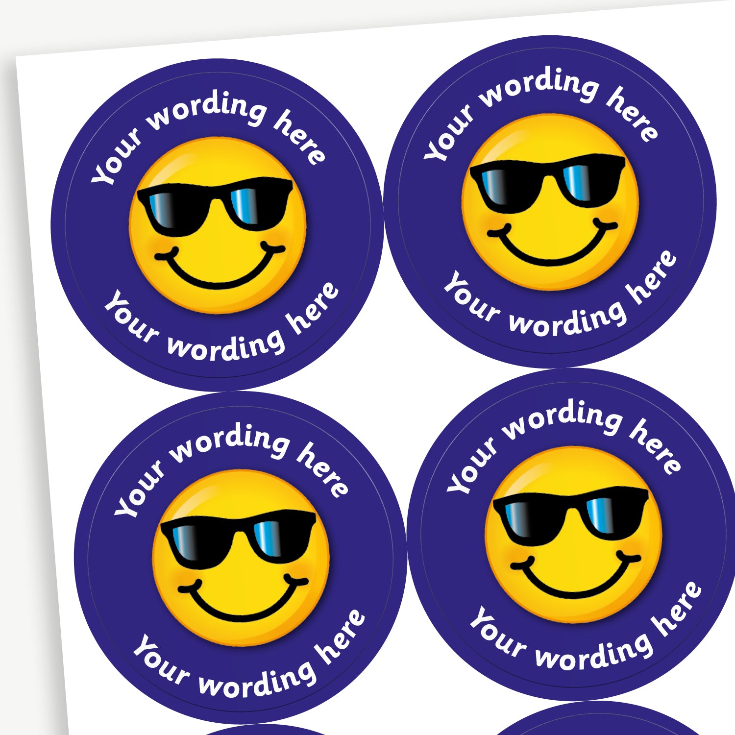 Sheet of 37mm round personalised stickers featuring a smiling emoji wearing sunglasses on a bright background, with customisable text above and below the emoji; designed for rewarding pupils' achievements.