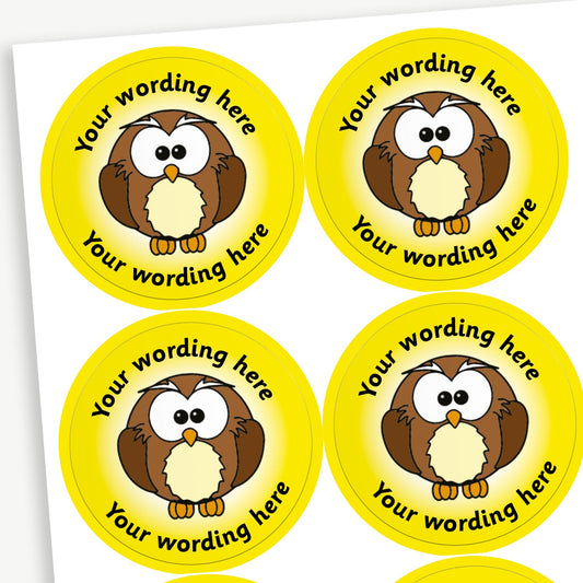 A sheet of yellow stickers featuring an illustration of a wise owl in the centre.  Placeholder text 'Your wording here' is above and below the image for customisation.