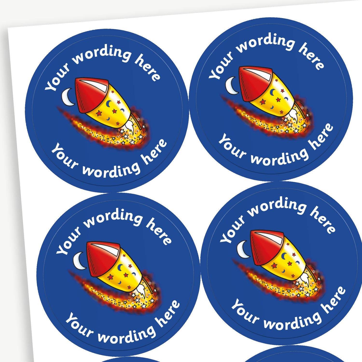 A sheet of blue stickers featuring a rocket shooting through the night sky in the centre.  Placeholder text 'Your wording here' is above and below the image for customisation.