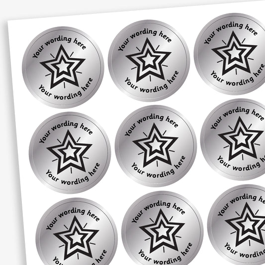 Sheet of 25mm round, metallic silver stickers, each featuring a bold black five-pointed star at the centre. Surrounding the star is placeholder text reading 'Your wording here' above and below, indicating customisable areas for personalised messages

