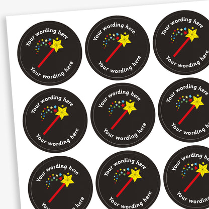 A sheet of circular, black reward stickers featuring a wand emitting a shower of stars. Placeholder text above and below 'Your wording here' indicate customisation options.