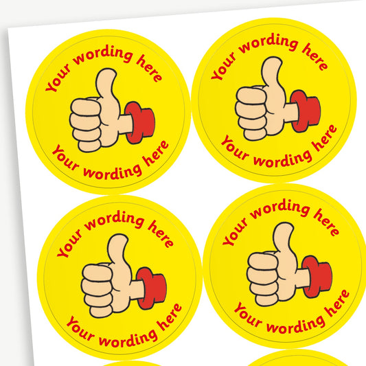 A sheet of yellow stickers featuring a thumbs up in the centre.  Placeholder text 'Your wording here' is above and below the image for customisation.