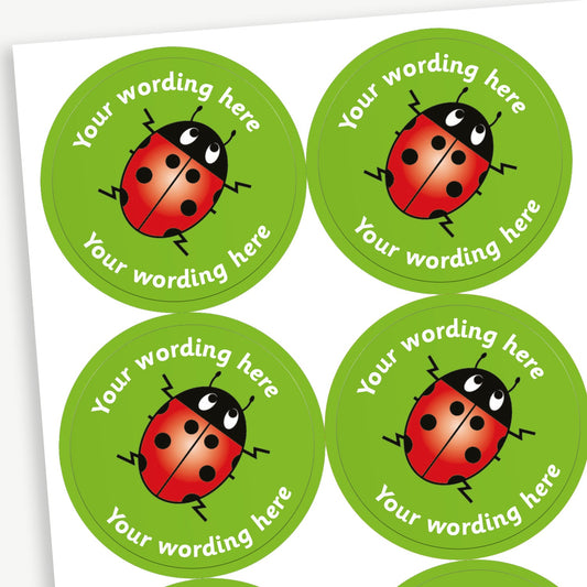A sheet of green stickers featuring a central image of a cartoon lady bug.  Placeholder text 'Your wording here' is above and below the image.