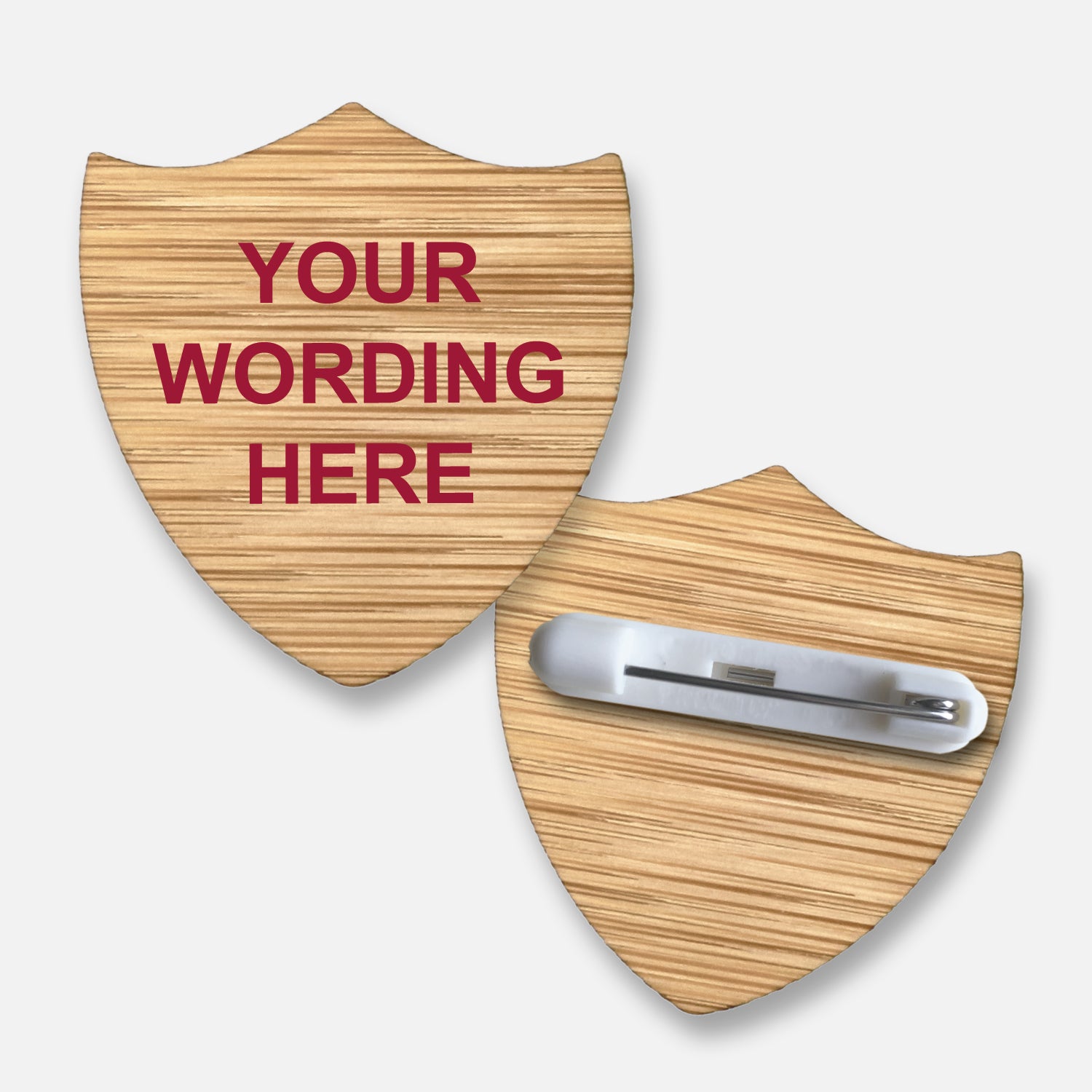 Eco-friendly personalised shield-shaped badge crafted from sustainable bamboo, featuring a customisable space for text or names, ideal for pupil awards, achievements, or eco-conscious recognition in educational settings.