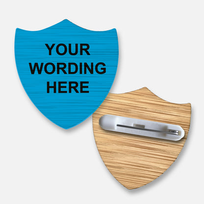 Eco-friendly personalised shield-shaped badge crafted from sustainable bamboo, featuring a customisable space for text or names, ideal for pupil awards, achievements, or eco-conscious recognition in educational settings.