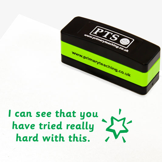 Rectangular self-inking, stackable, stamper 44mm x 13mm with green ink, featuring the phrase 'I can see that you have tried really hard with this.' across 3 lines of text.  Next to the phrase is a shining star icon.