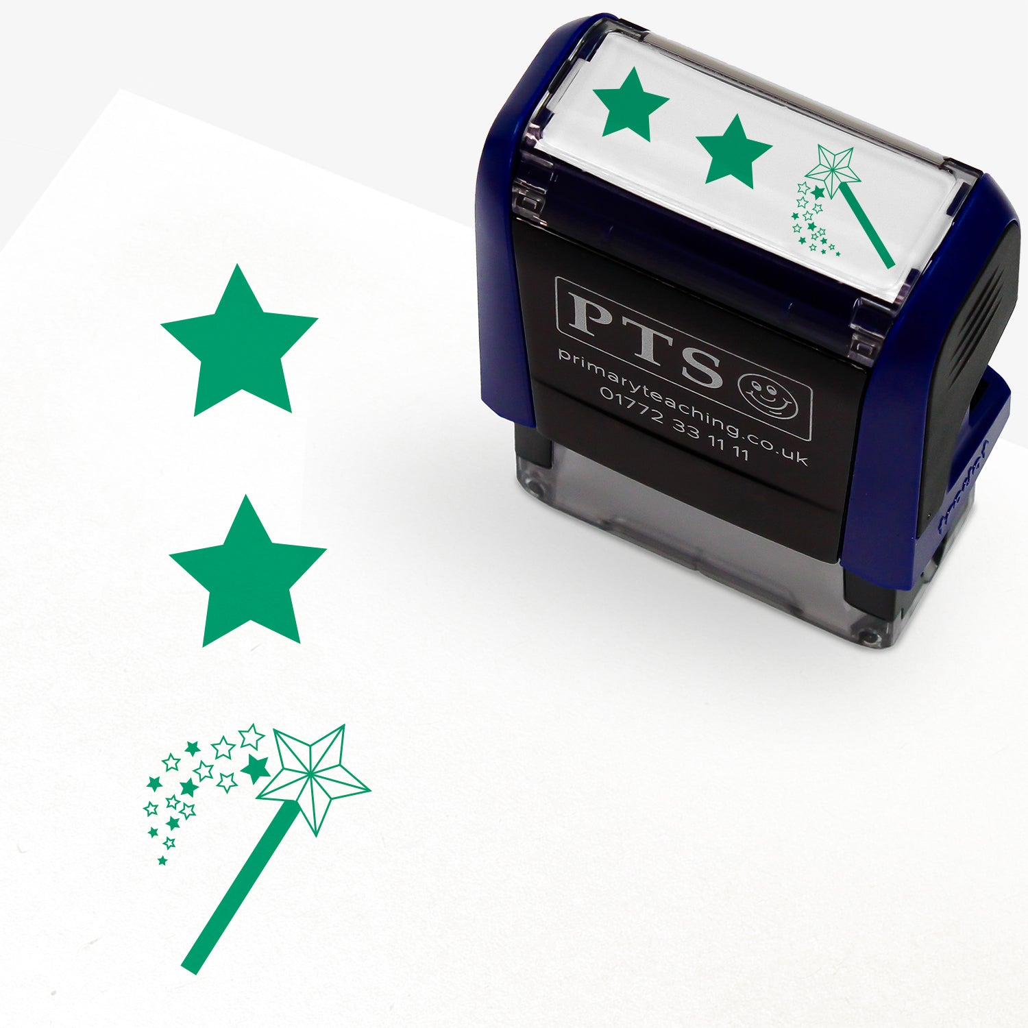 A rectangular pre-inked teacher stamper measuring 38mm x 15mm, featuring a green vertical impression: a star at the top, a star in the middle and a wand with a shower of stars underneath.
