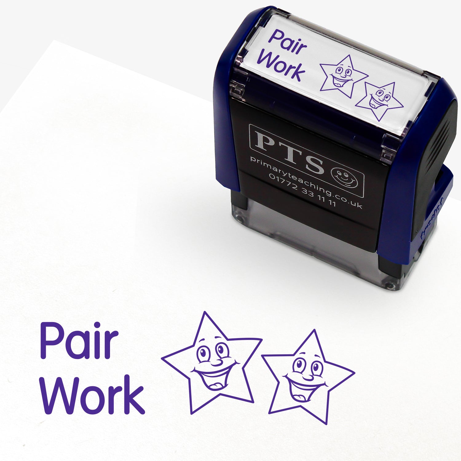 Rectangular self-inking stamper measuring 38mm by 15mm, featuring the phrase 'Pair Work' and 2 smiling stars in purple ink.