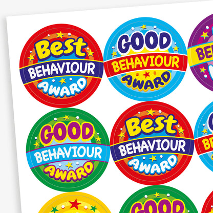 Brightly coloured circular stickers with either 'Best Behaviour Award' or 'Good Behaviour Award' in bubble writing over a background of cyan, green, red, purple or yellow, all with a shower of stars.