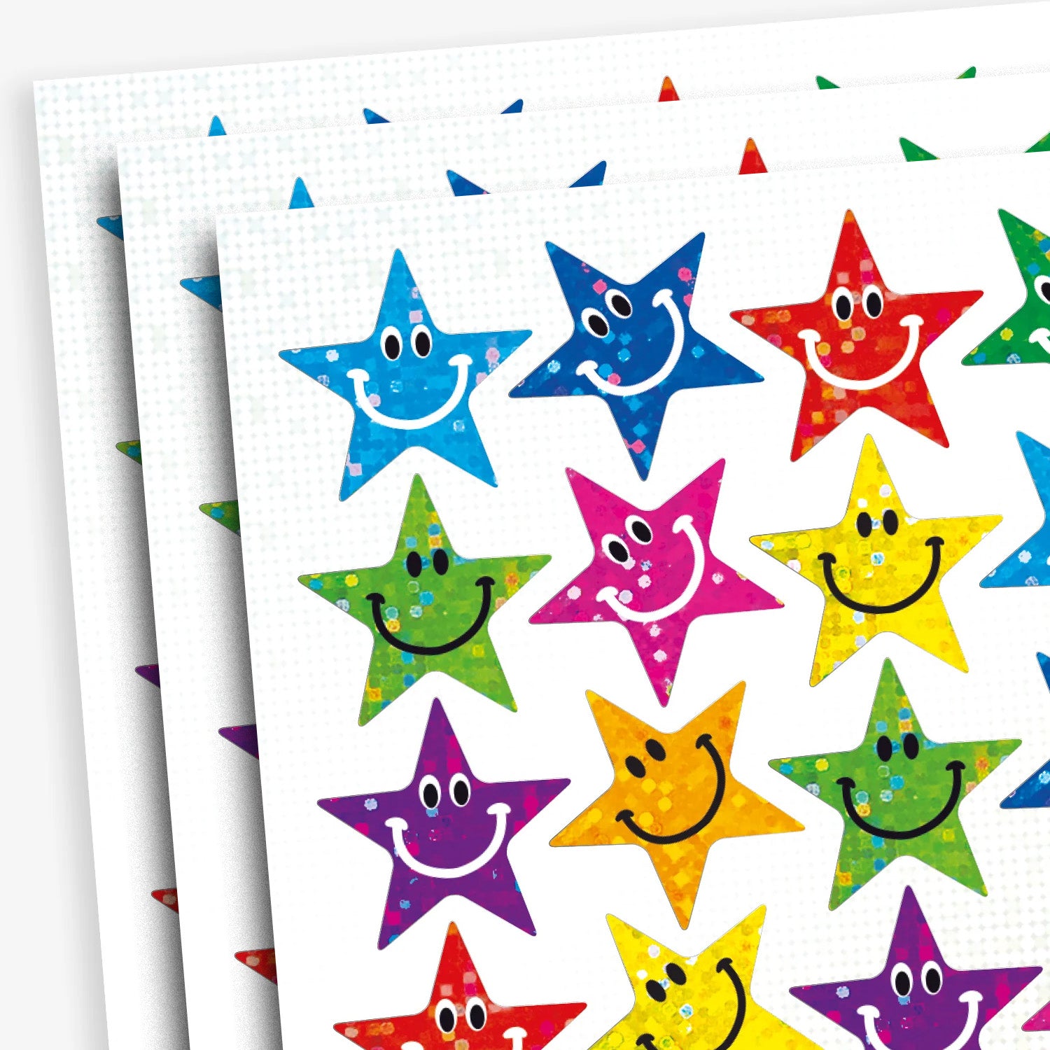 A sheet of colourful star shaped smiley face stickers with a holographic finish. Each sticker features a cheerful smiling face in different colours including blue, green, red, silver, purple and yellow.