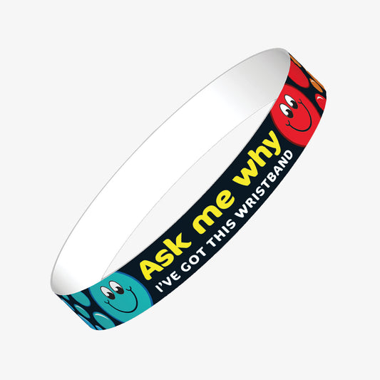 A set of ten colourful, smiling emoji wristbands featuring the phrase 'Ask me why I got this wristband' in bold text; designed as a motivational tool to celebrate pupil achievements and encourage positive conversations in educational settings
