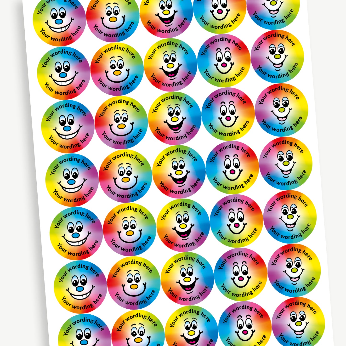 A sheet of 37mm round personalised stickers with sweet shop scent. The rainbow spectrum coloured stickers display various cartoon like smiling faces. Text around the character is customisable.
