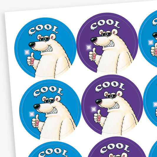 Sheet of 32mm round mint-scented stickers featuring a polar bear wearing sunglasses against either a vibrant blue or purple background.  Text on the sticker says 'COOL'.
