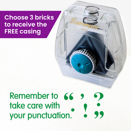 One Twist N Stamp brick in green ink. The phrase 'Remember to take care with your punctuation' is alongside many punctuation symbols
