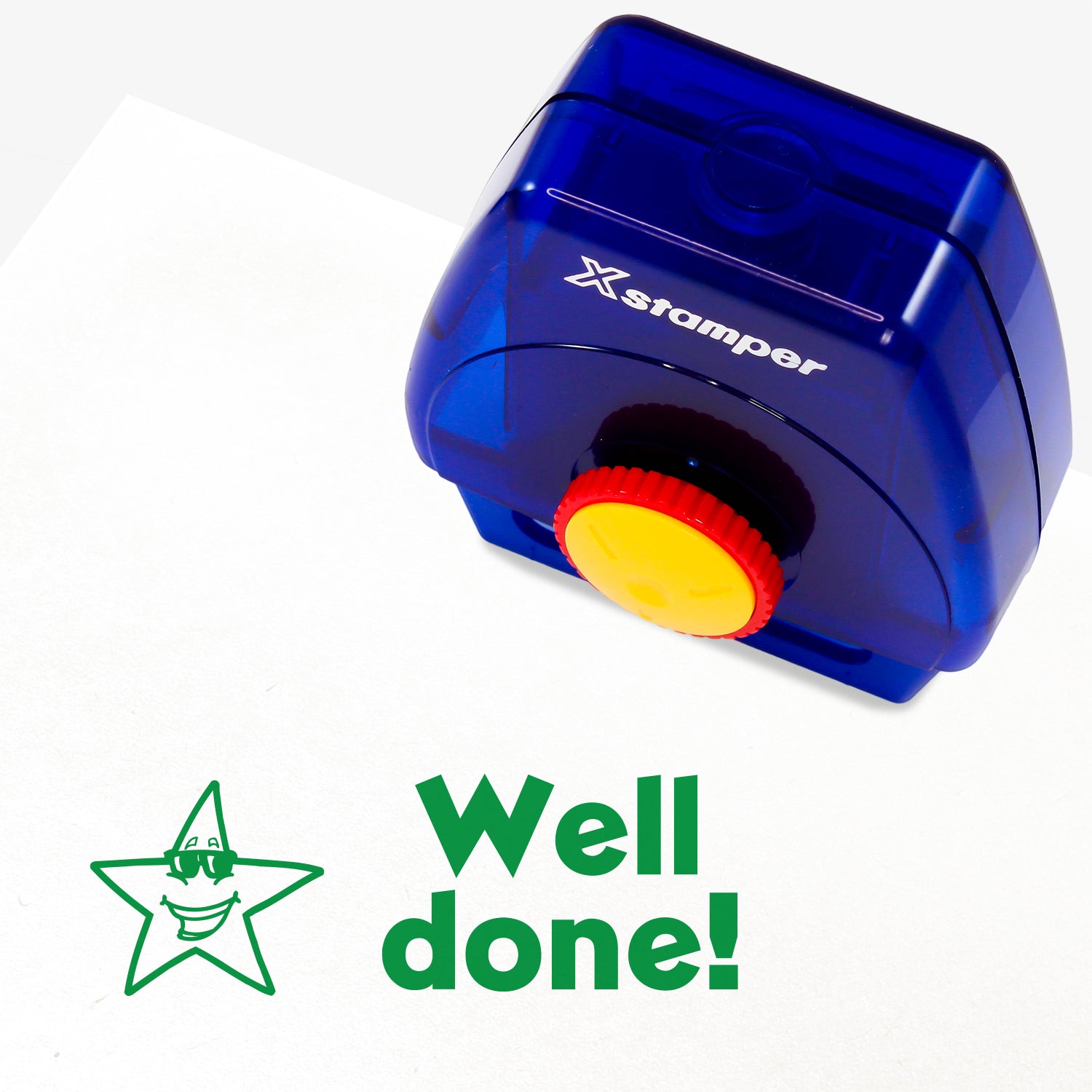 One Twist N Stamp brick in green ink with a star wearing sunglasses to the left and the text saying 'Well done!'
