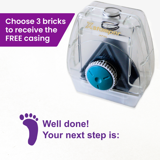 One Twist N Stamp brick in purple ink with a footprint to the left and saying 'Well done! Your next step is:'.